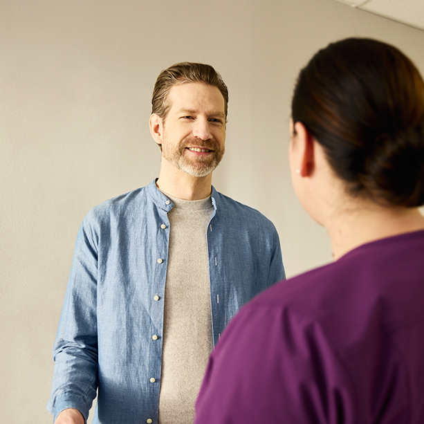 Patient smiling at nurse